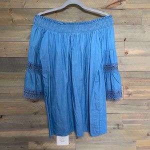 off the shoulder dress with bell sleeves.